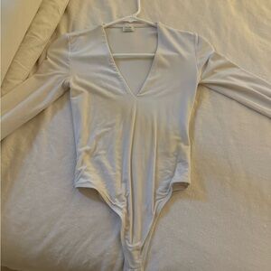 Elegant White V-Neck Bodysuit